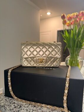 CHANEL Mini Quilted Flap Bag in Metallic Gold